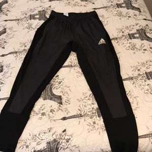 Black and gray adidas’s sweatpants